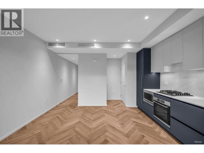 Building Photo - 775 W 49th Ave