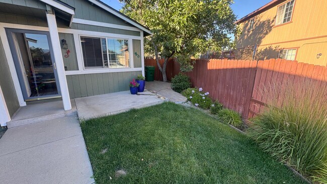 Building Photo - 4bed/2bath/2car garage. RV parking & massive landscaped backyard in cut-de-sac