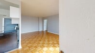 Located at 440 Winona Dr in Toronto's vibrant Corso Italia neighbourhood, this well-appointed one-bedroom, one-bathroom unit offers a thoughtfully organized layout across a single floor. Classic parquet wood flooring flows throughout the living areas and bedroom, lending warmth and character to the space. The living room is generously proportioned, flooded with natural light through two large windows that overlook mature trees, and features traditional cast-iron radiators that add a charming period detail. The galley-style kitchen is efficiently designed with ample white cabinetry, grey countertops, a stainless steel refrigerator, and an electric range, complemented by tile flooring and a ceiling light fixture. The bedroom offers a comfortable footprint with a built-in sliding-door closet and the same warm parquet flooring found throughout. The bathroom is clean and functional, featuring a full tub-shower combination with white subway tile surround, a vanity with storage, and tile flooring. A dedicated entrance area provides a practical transition into the home. Neutral grey walls and white trim throughout create a bright, cohesive aesthetic well-suited for comfortable city living.