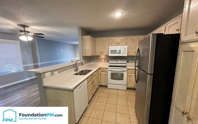 Foto del edificio - 8230 Town N Country Dr