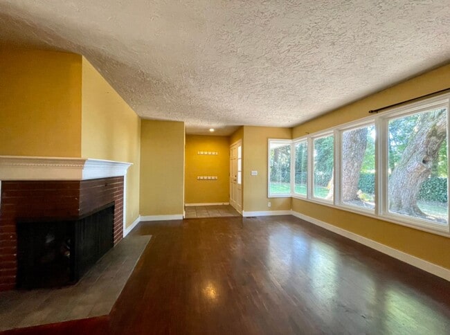 Building Photo - Updated Ranch with Large Fenced Yard, Tucked Off Walker Road~ Gas Fireplace~ Great Natural Light~...