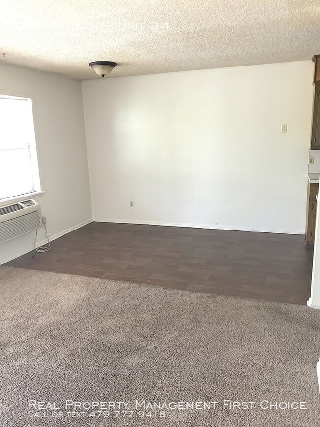 Building Photo - Phoenix Village Apartments Welcomes You