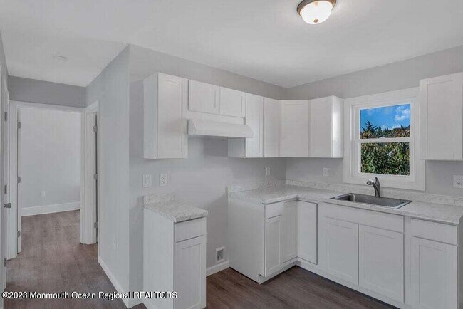 Foto del edificio - 7 Pollys Park Dr