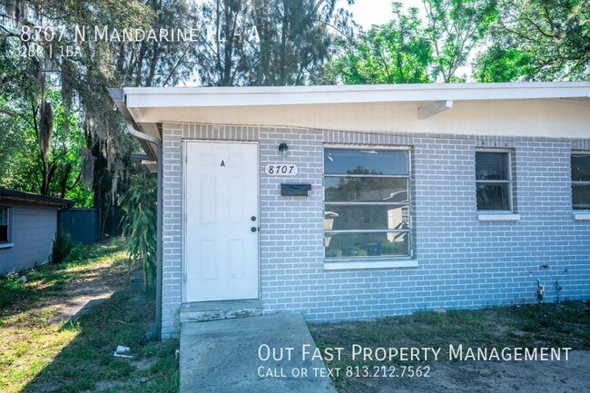 Building Photo - 8707 N Mandarine Pl