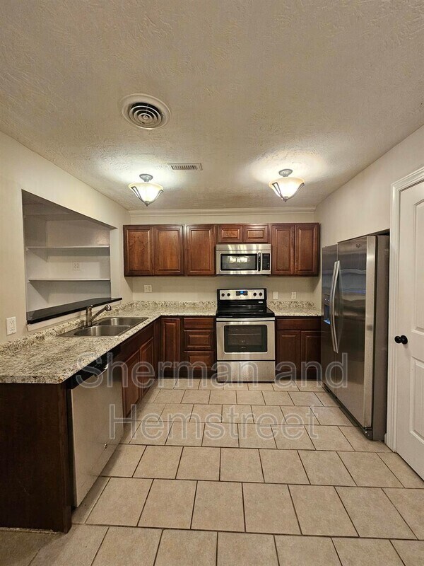 Foto del edificio - 3306 Tanglewood Dr