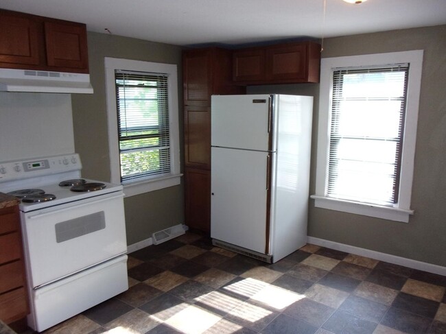 Stove and Refrigerator included - 306 S Prairie Ave