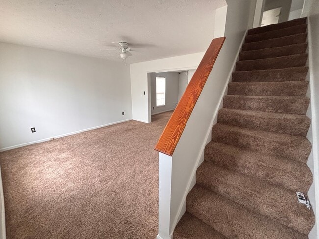Building Photo - Spacious 4 Bedroom 2.5 Bath Single Family Home. Large Fenced in Yard. Front Porch. Garage.