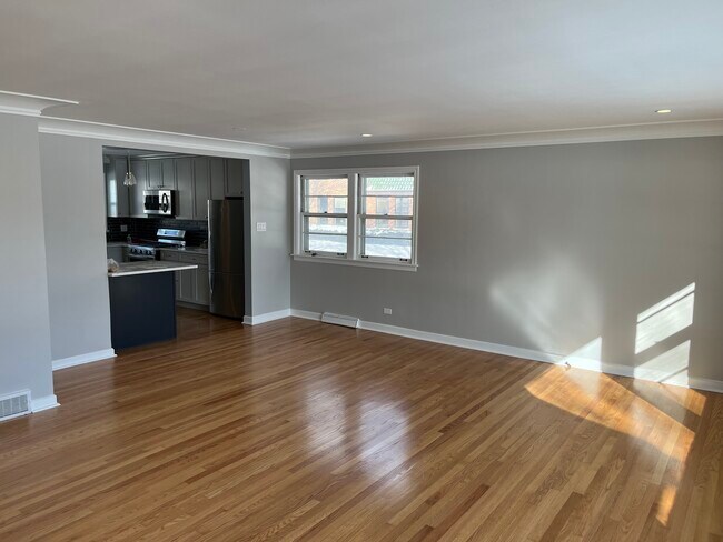 Living room from entryway - 6558 N Olympia Ave