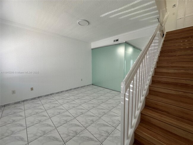 Building Photo - 9837 W Okeechobee Rd