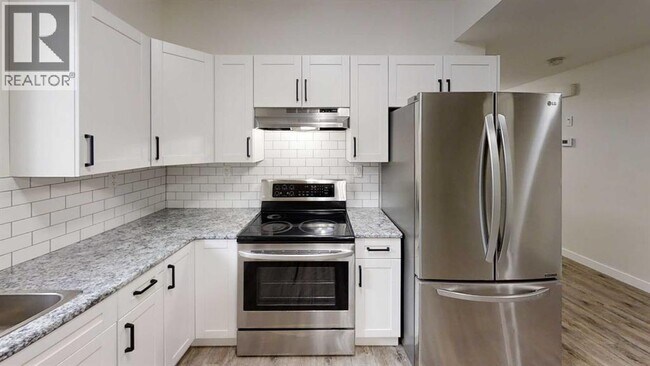 Photo du bâtiment - 9607-9113 113 Ave