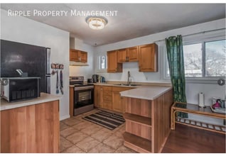 Building Photo - 2402-2450 50 St NE