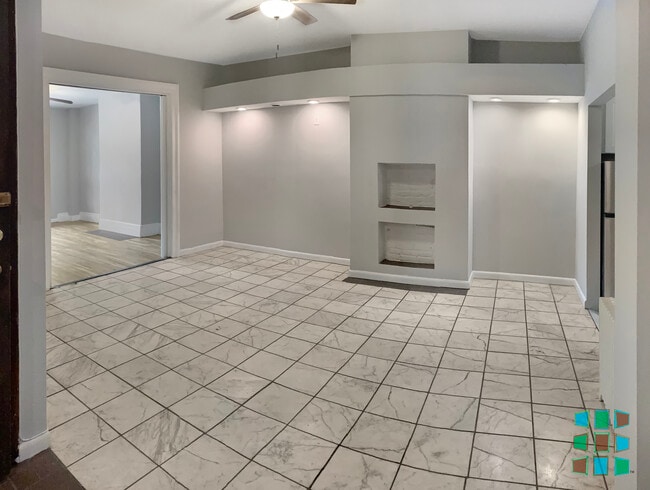 Living/Dining area with opened bedroom pocket doors - 131 Hall Street