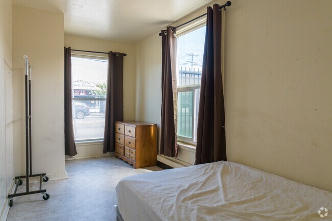 Guest Room with Large Windows - 1000 E 10th St