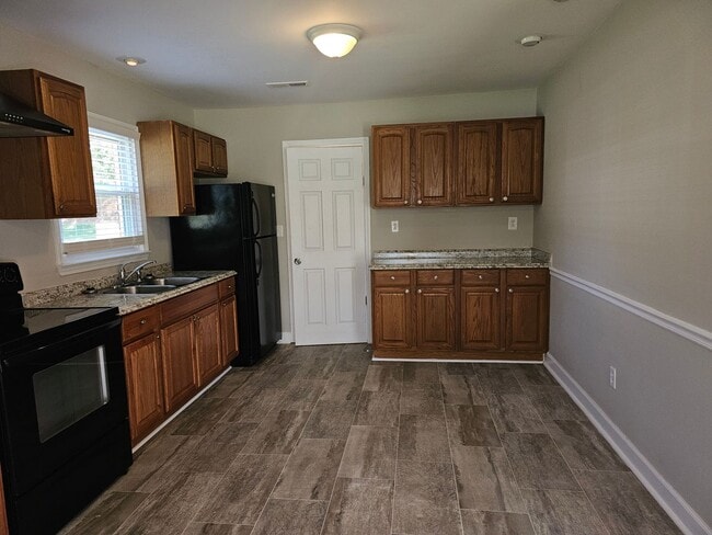 Building Photo - New to Rental Market- Brick Ranch Home wit...