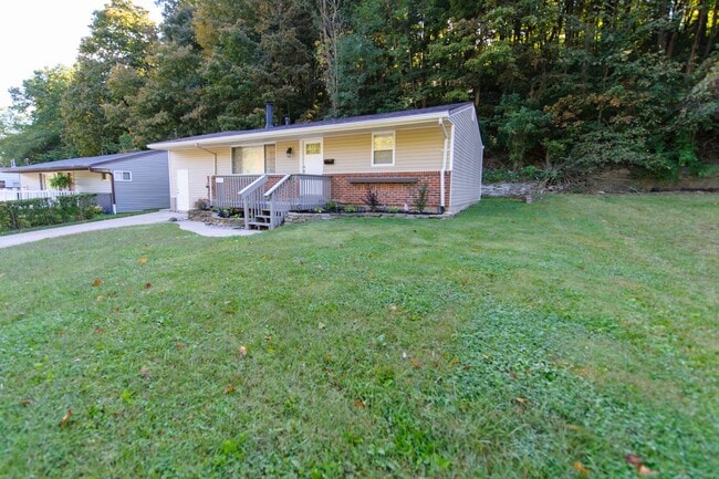 Building Photo - REMODELED BRICK & VINYL RANCH WAITING FOR ...