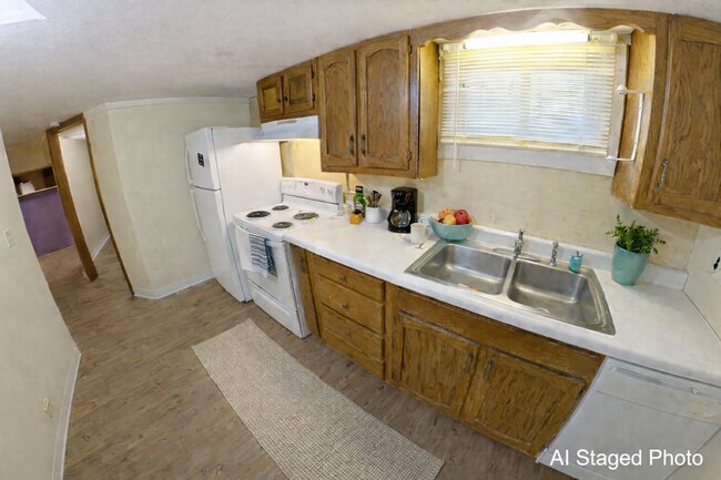 Building Photo - Across the Street from KSU Campus! Huge House + Two Kitchens + Two Sets of Washers & Dryers + Off...