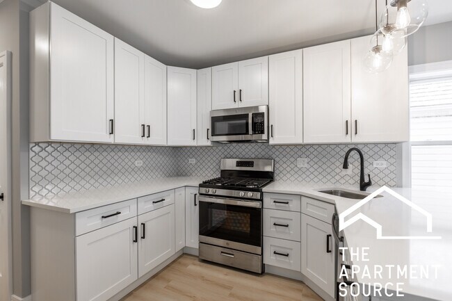 Foto del edificio - 3443 N Ridgeway Ave