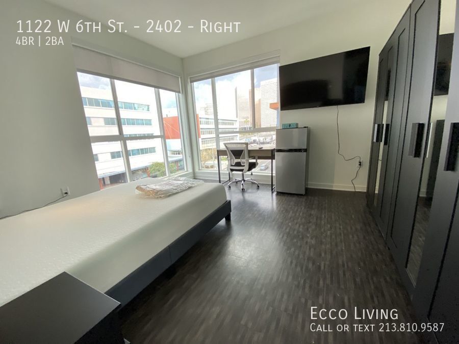 Primary Photo - Stunning Corner Bedroom with Floor-to-Ceil...