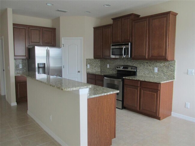Foto del edificio - 4956 Maple Park St