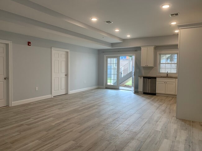 Kitchen open to living room - 210 W Grand St