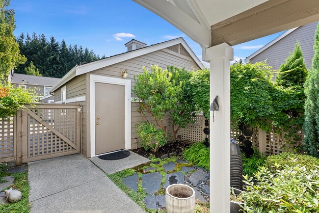 Private front courtyard with optional water feature - 1220 Weaver Rd NW