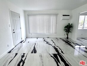 Building Photo - 1630 W 104th St