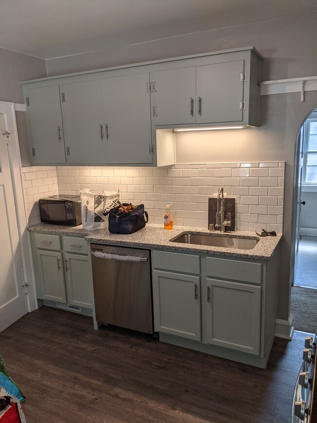 new dw, granite, tile, floor sink ect. - 2574 N 70th St