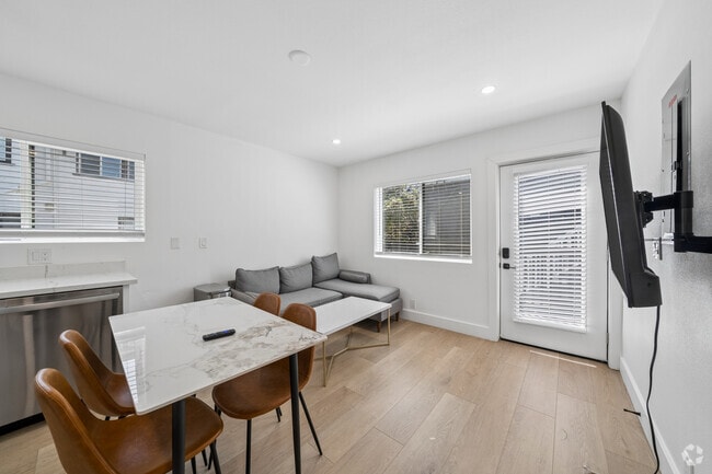 ADUA - 5BR, 2BA - 1,197SF - Living Room - 2618 College