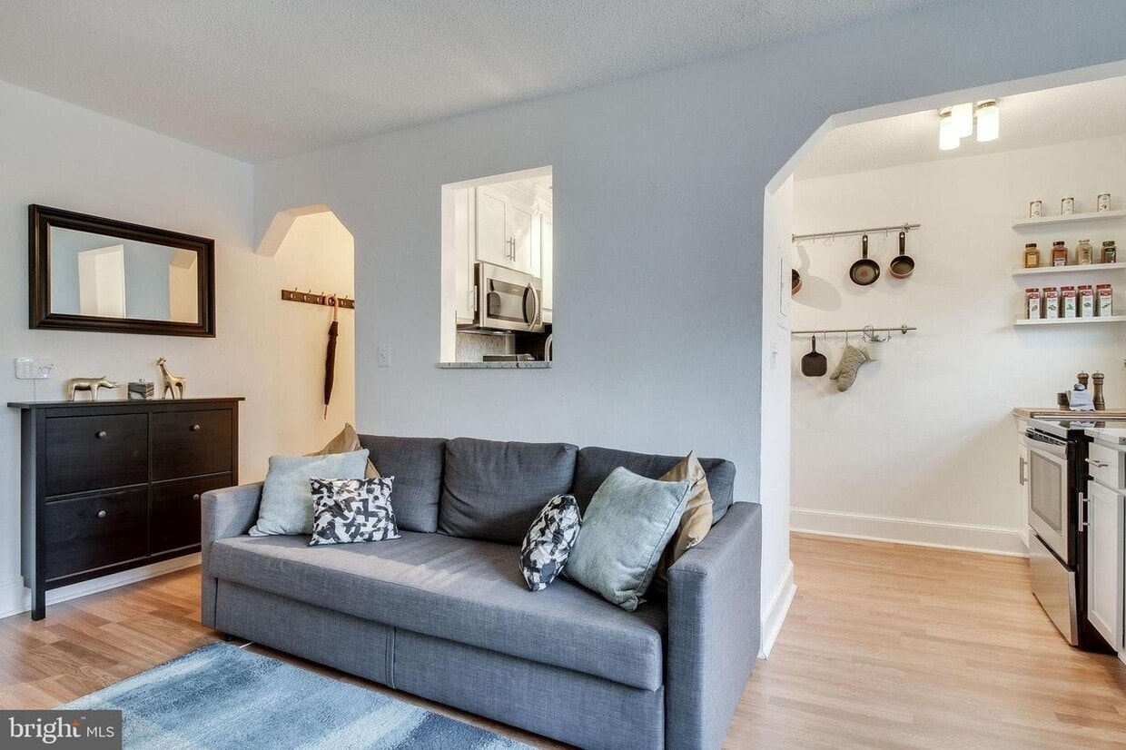 Living room with partial view of kitchen - 1363 K St SE