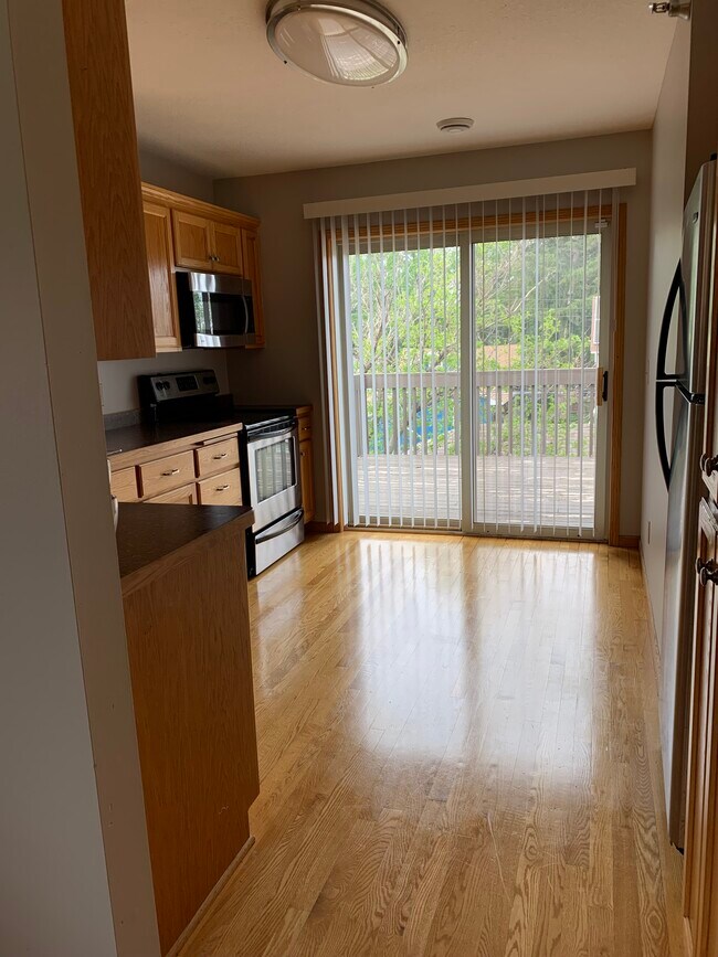 Kitchen with balcony view - 4347 Fremont Ave N