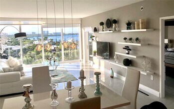 Building Photo - 10275 Collins Ave
