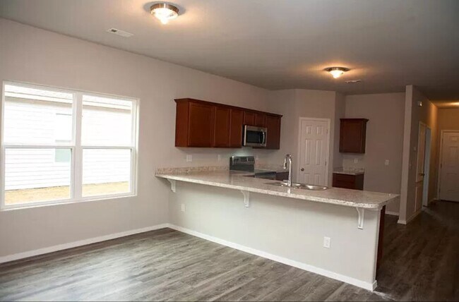 Building Photo - 4-Bedroom, 2-Bathroom West Fayetteville Home with fenced in backyard and 2x car garage - AVAILABL...