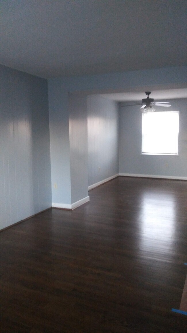 Living room that leads into the dining room - 706 Seawall Rd
