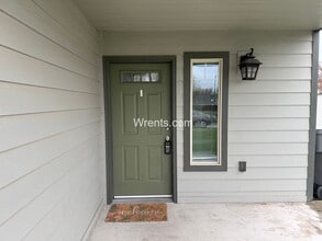 Building Photo - 10317-10319 E Maxwell Ave