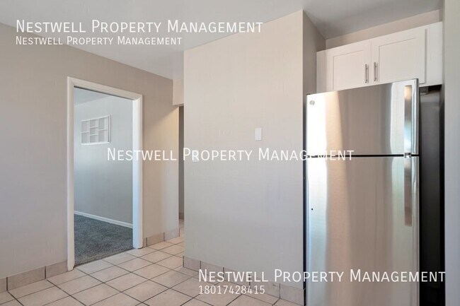 Building Photo - FREE 1ST MONTH'S RENT - Remodeled 2-bed Un...