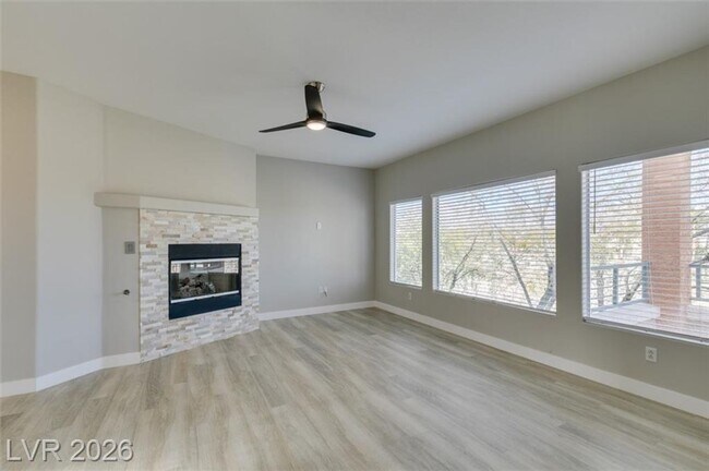 Building Photo - Beautiful Summerlin Condo with Mountain Views, Fireplace & Resort-Style Amenities!