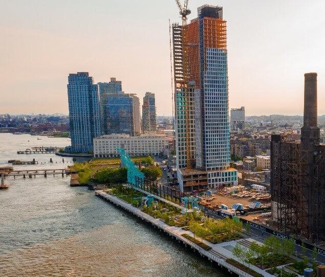 An aerial shot of Williamsburg’s beautiful Domino Park and the Old Sugar Factory