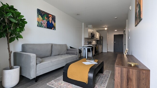 Building Photo - One Plus Den, One Free Rent