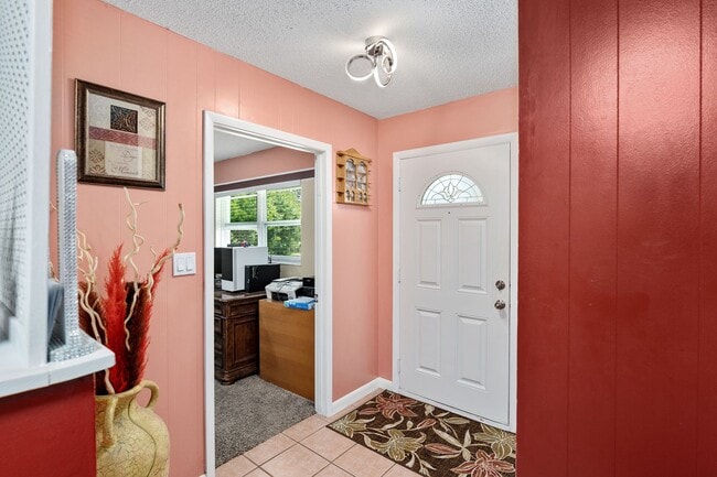 Building Photo - Beautiful 4/3 home With Attached Mother In...