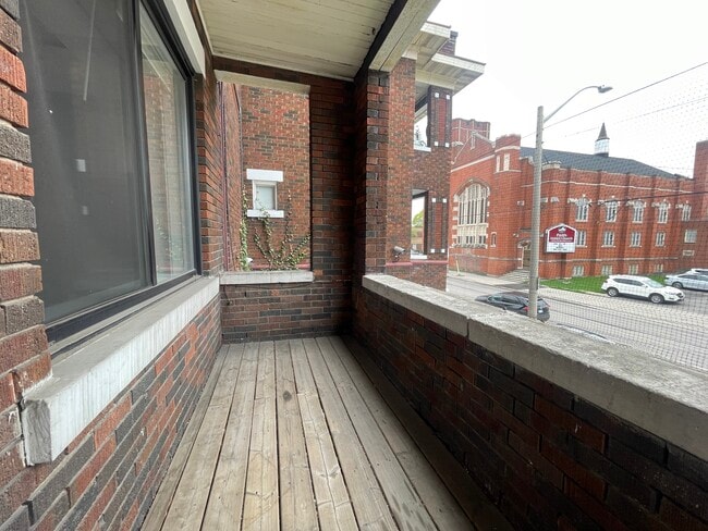 Building Photo - Private Balcony and HUGE windows at this 1...