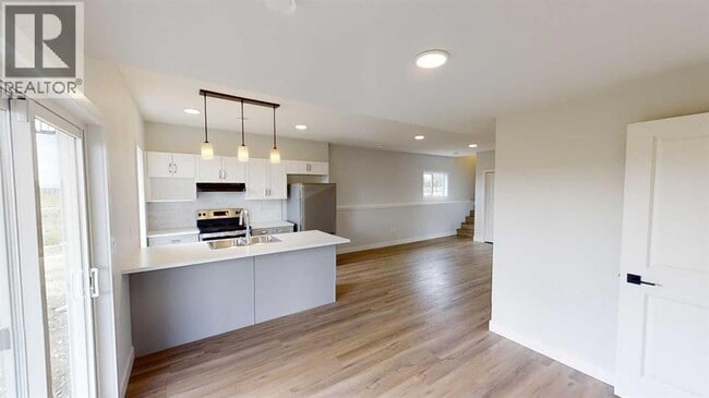 Building Photo - 10529-10133 133 Ave.