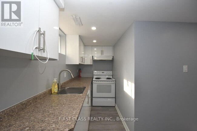 Photo du bâtiment - 1506-1506 Simcoe St N
