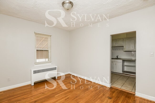 Building Photo - Proper Design. Smartly Priced. Ready for Move-In!