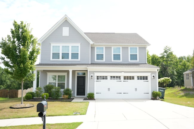 This wonderful home has a covered rocking ... - This wonderful home has a covered rocking ...