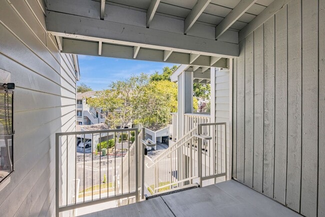 Building Photo - Top-Floor 2BR Condo for Rent – Gated Commu...