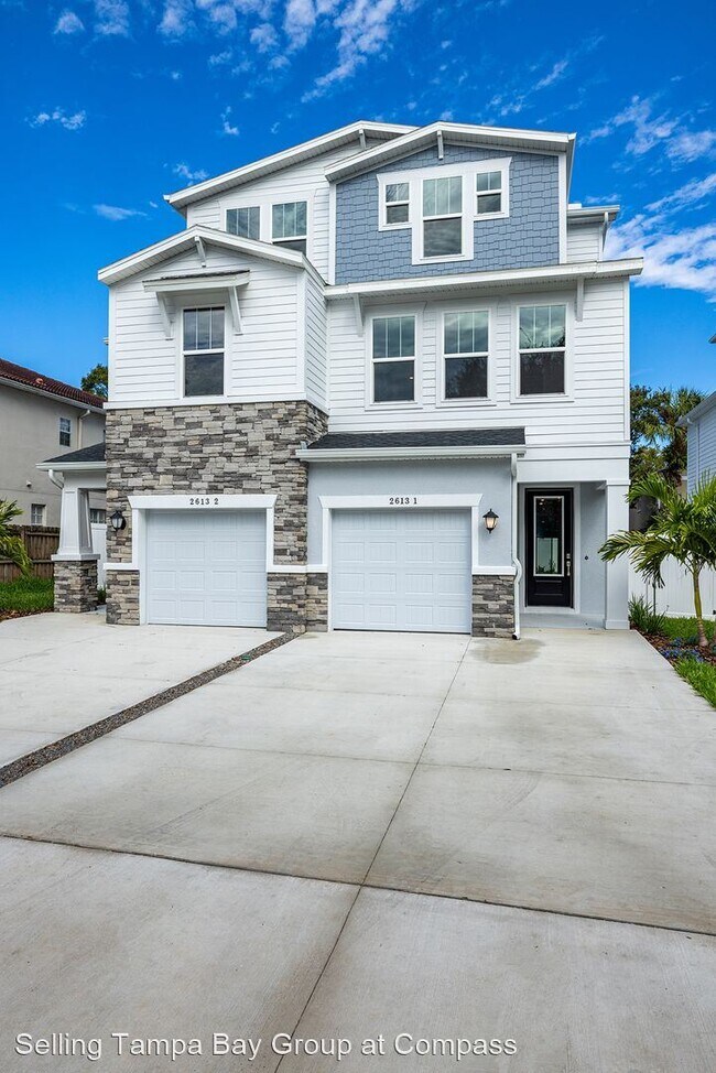 Building Photo - 4 br, 3.5 bath House - 2613 S Horatio Ave #1