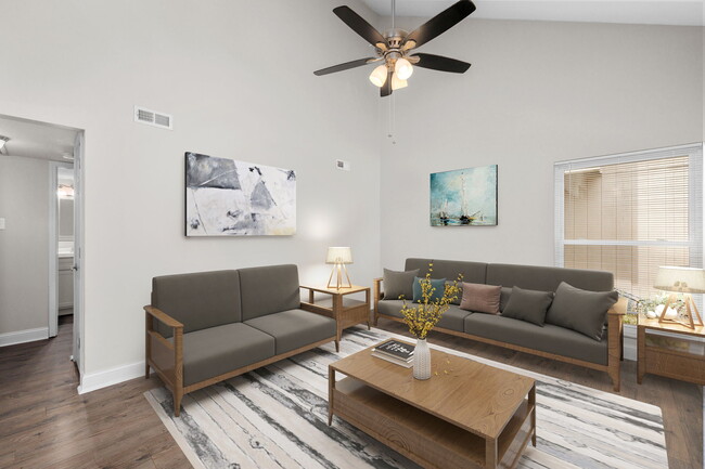 Living room with vaulted ceiling. - 425 Great Hill Dr