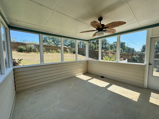 Building Photo - Sunroom and Fenced Backyard in the Heart o...