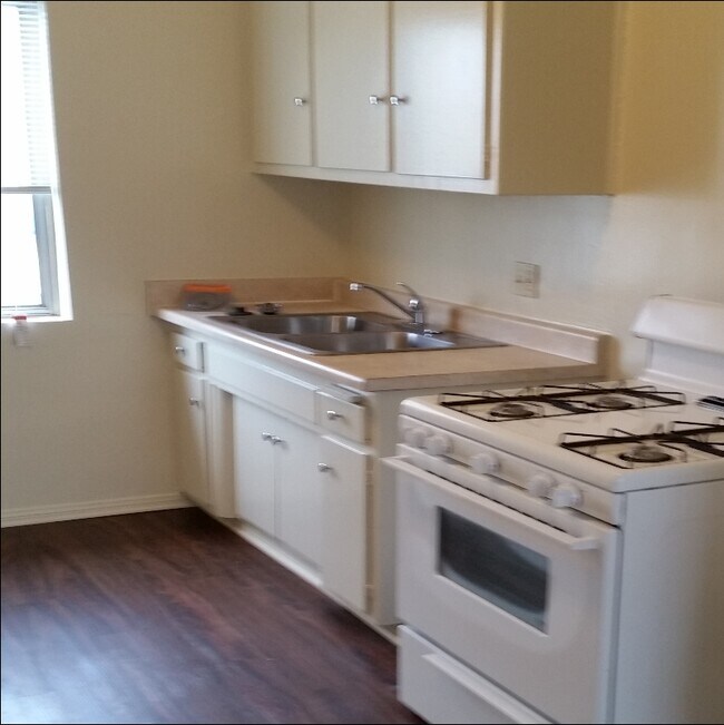 Kitchen and dining area, optional stove - 327 W Carson St