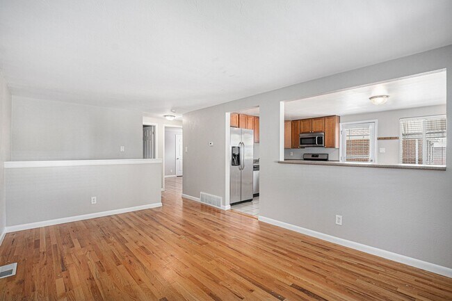 Building Photo - Spacious 4BR with bonus space and a 2 car ...